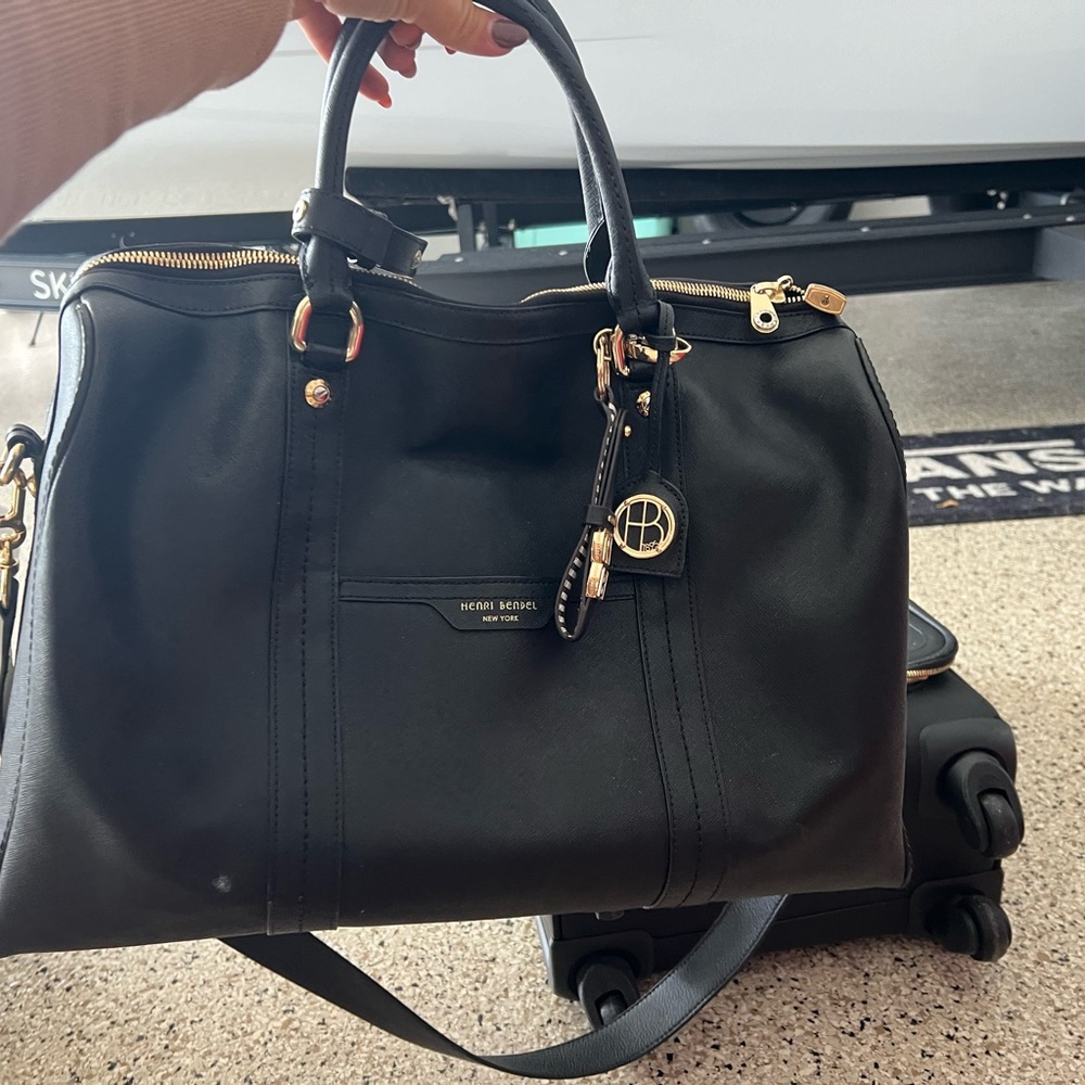 Henri Bendel West 57th duffle bag (matching suitcase on my page)